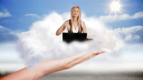 Giant-hand-presenting-woman-using-laptop-showing-thumbs-up