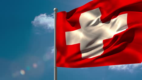 Swiss-national-flag-waving-on-flagpole