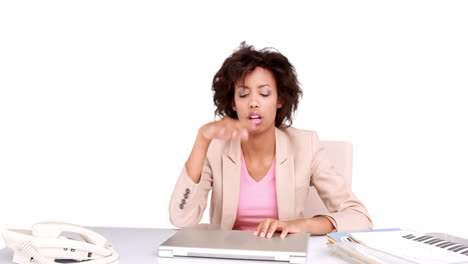 Businesswoman-feeling-stressed-at-her-desk