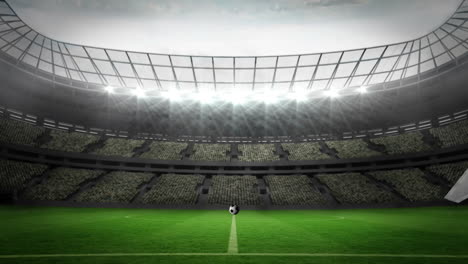Ball-breaking-glass-into-large-football-stadium