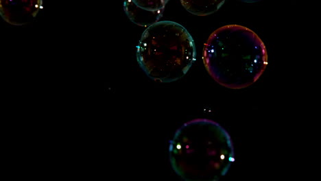 Bubbles-floating-on-black-background