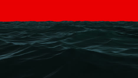 Choppy-blue-ocean-under-red-screen-sky-