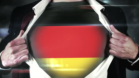Businessman-opening-shirt-to-reveal-german-flag