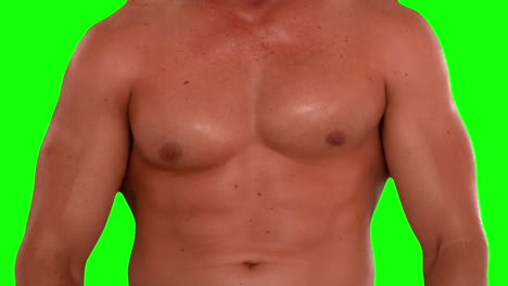 Hombre-Musculoso-Flexionando-Sus-Pectorales