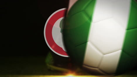 Football-player-kicking-nigeria-flag-ball