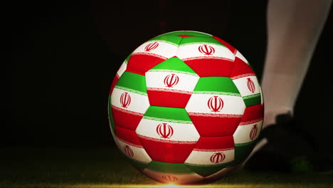 Football-player-kicking-iran-flag-ball