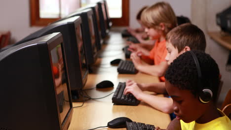 Row-of-pupils-working-in-computer-class