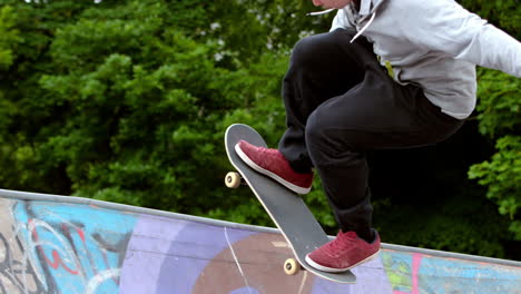 Young-skateboarder-skating-the-outdoor-skatepark