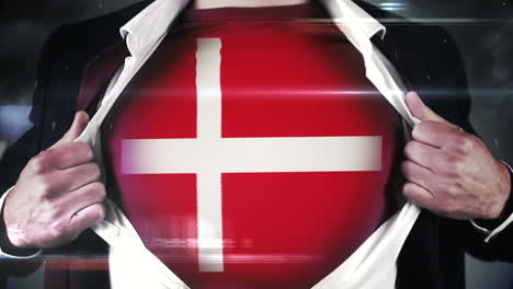 Businessman-opening-shirt-to-reveal-swiss-flag