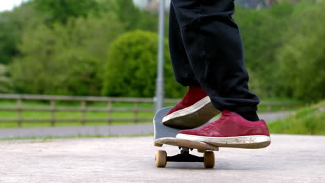 Young-skateboarder-skating-the-outdoor-skatepark