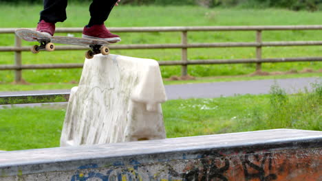 Young-skateboarder-skating-the-outdoor-skatepark