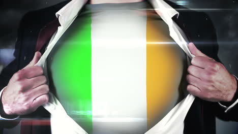 Businessman-opening-shirt-to-reveal-irish-flag