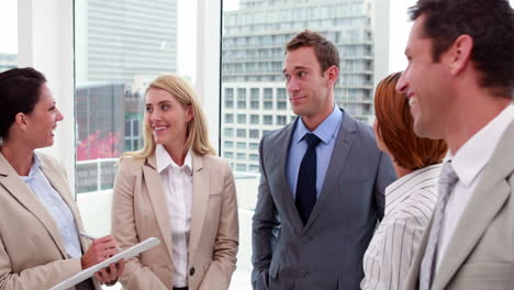Business-people-standing-and-talking