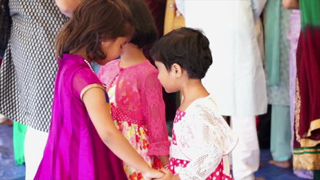 Little-girls-play-in-a-circle-at-a-HIndu-festival