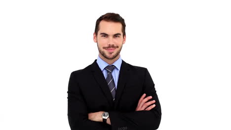 Confident-businessman-smiling-at-camera