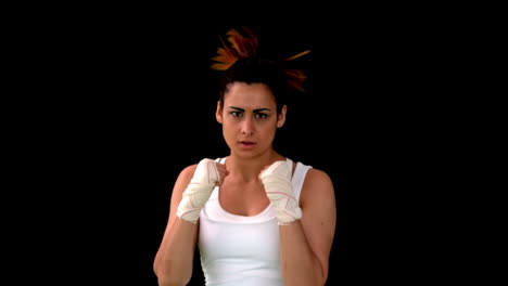 Tough-boxing-girl-punching-to-camera