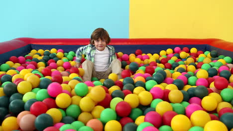 Cute-little-boy-playing-in-ball-pool
