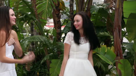 Pretty-friends-admiring-their-dresses