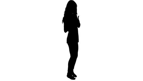Silhouette-of-woman-showing-thumbs-up