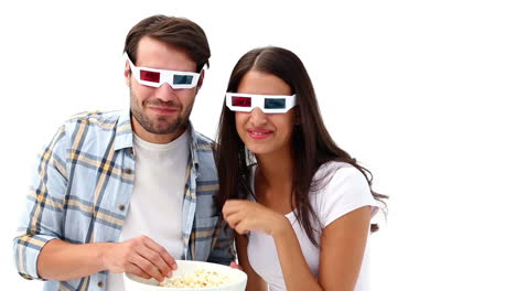 Attractive-young-couple-watching-a-3d-movie