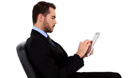 Young-businessman-using-tablet-pc