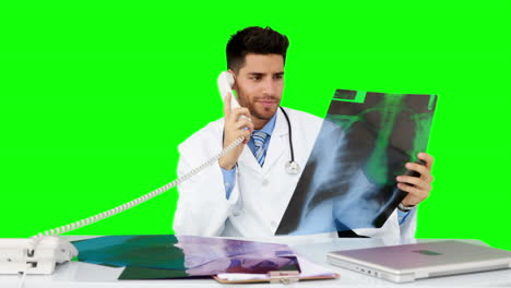 Young-doctor-working-at-his-desk