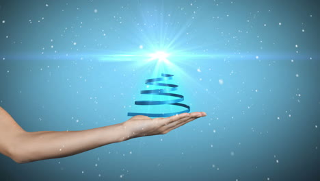 Hand-presenting-christmas-tree-design-