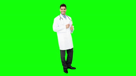 Young-doctor-standing-with-clipboard