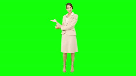 Young-businesswoman-talking-at-camera