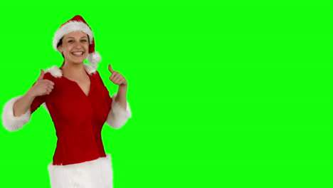 Festive-brunette-showing-thumbs-up