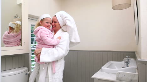 Mother-and-daughter-wearing-bathrobes