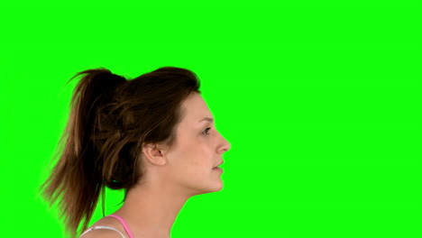 Fit-woman-jogging-on-green-screen