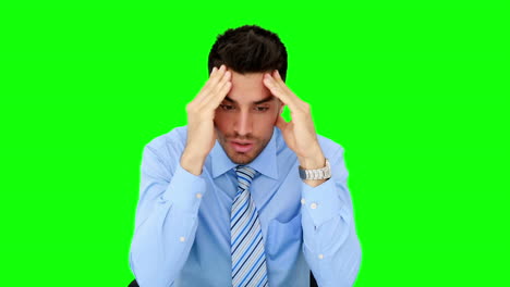 Young-businessman-getting-a-headache