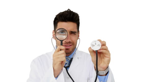 Young-doctor-looking-through-magnifying-glass