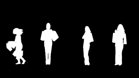 Silhouetten-Von-Frauen-Mit-Ihren-Einkäufen-Auf-Schwarzem-Hintergrund