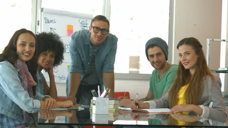 Students-looking-at-camera-together-during-meeting