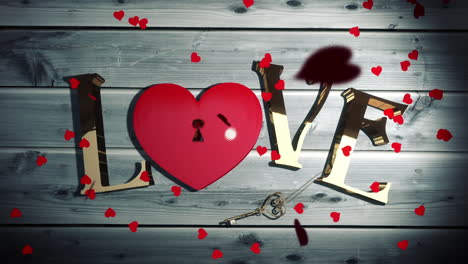 Heart-confetti-falling-on-golden-love-text-with-heart-lock