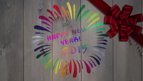 Happy-new-year-message-against-wood-with-bow