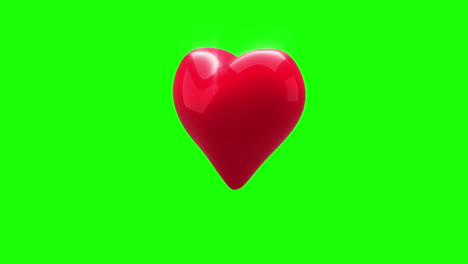 Rotes-Herz-Dreht-Sich-Auf-Grünem-Hintergrund