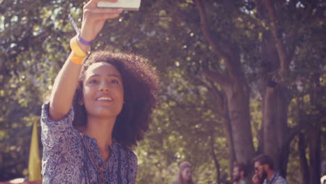 In-high-quality-format-pretty-hipster-taking-a-selfie