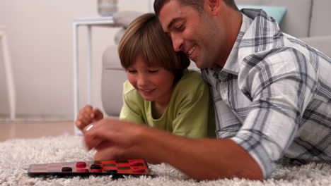Father-and-son-playing-board-game