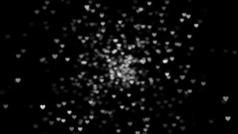 Silver-shimmering-hearts-on-black-background