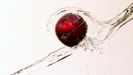 Apple-moving-through-stream-of-water