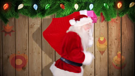 Santa-carrying-sack-of-gifts-against-festive-wooden-background