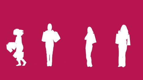 Silhouettes-of-women-with-her-shopping-on-pink-background