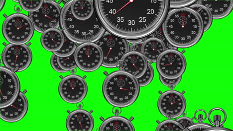Stopwatches-falling-on-green-background