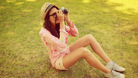 In-high-quality-4k-format-pretty-brunette-with-retro-camera-