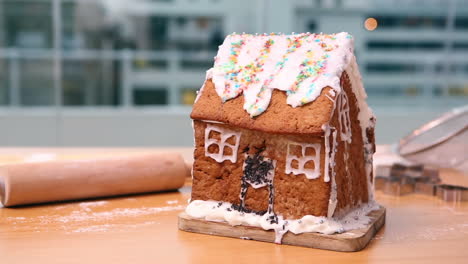 Messy-gingerbread-house-on-the-counter