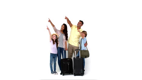 Happy-family-with-luggage-pointing