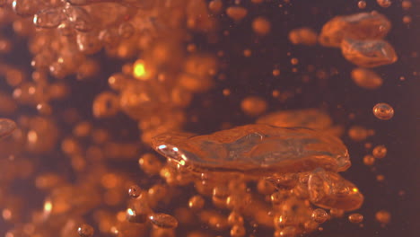 Orange-bubbles-rising-in-water